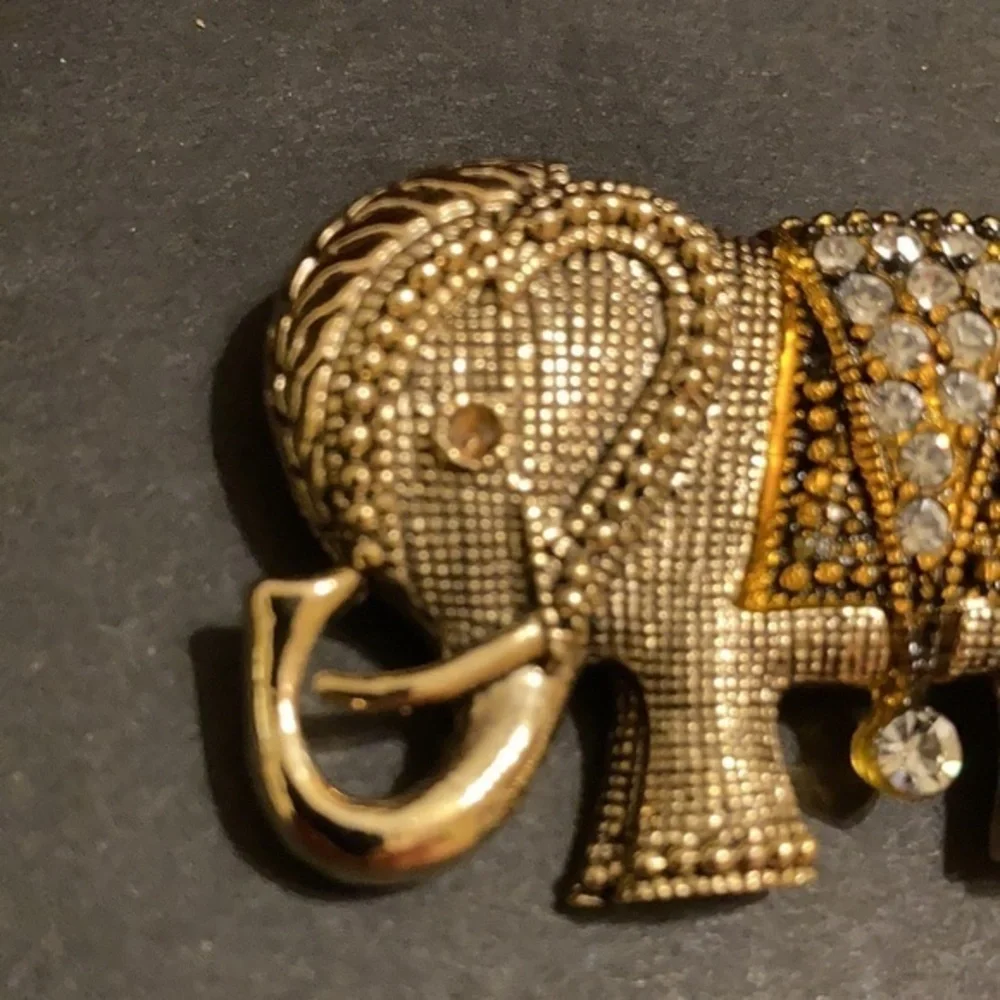 Gorgeous gold tone and crystal elephant brooch